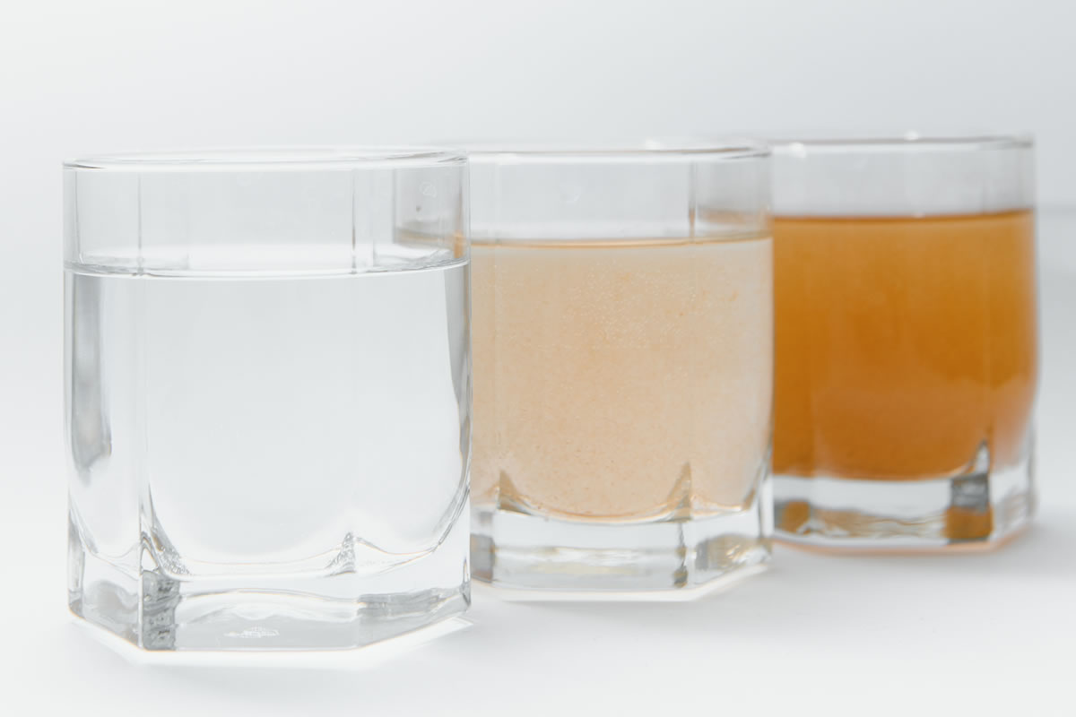 Three glasses of drinking water with different quality standards Three glasses of drinking water with different quality standards