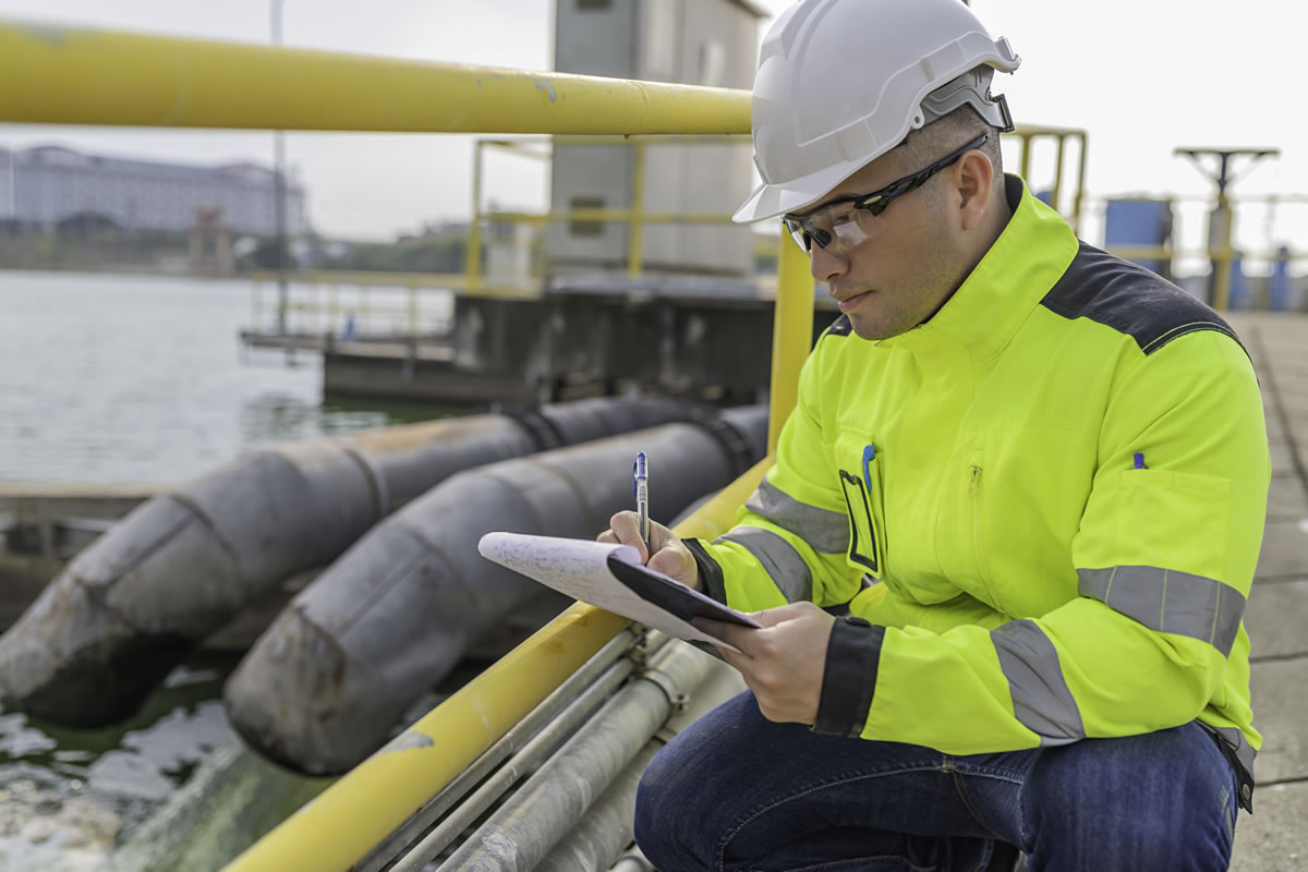 Engineer assessing-wastewater treatment processes