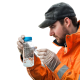 Engineer taking water sample for quality analysis
